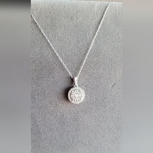 Rhodium plated over 10kt gold and diamond necklace. 18" long